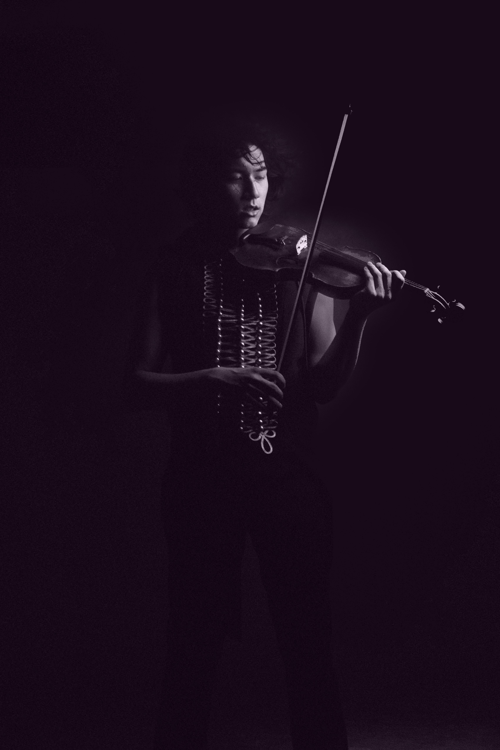 Iskandar playing the violine